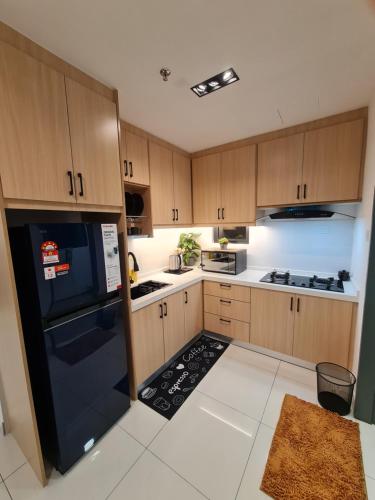 Kuchyň nebo kuchyňský kout v ubytování Trio Luxury Suites