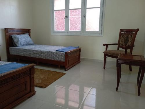 Katil atau katil-katil dalam bilik di Magnifique appartement proche de Sidi Bouzid