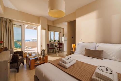 Postel nebo postele na pokoji v ubytování Jolly Suites