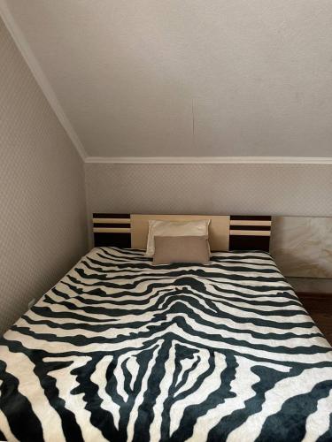 Postel nebo postele na pokoji v ubytování VIP hotel
