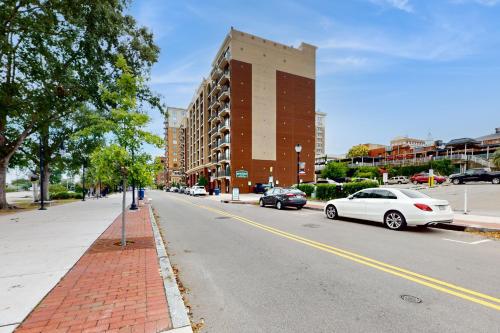 a street with cars parked on the side of a building at River View Condo 602 & 603 in Wilmington