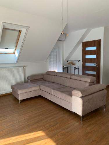 Zona de estar de Fehér Orchidea Apartman