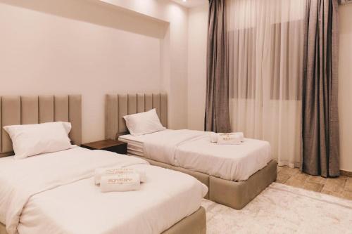 Postel nebo postele na pokoji v ubytování Signature Stays Breezy Modern Apt
