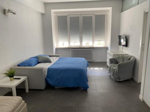 Ένα ή περισσότερα κρεβάτια σε δωμάτιο στο L'appartamento di Edo