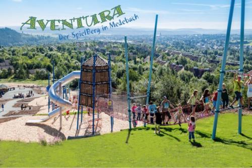 a group of people playing in an amusement park at Ferienwohnung Kasia in Medebach