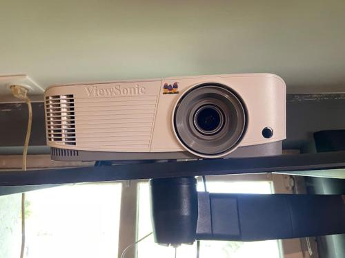 a camera sitting on top of a shelf at Magnifique maison spa in Aix-en-Ergny
