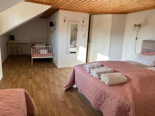 Stegemans Horse hotel and Country Lodgeにあるベッド
