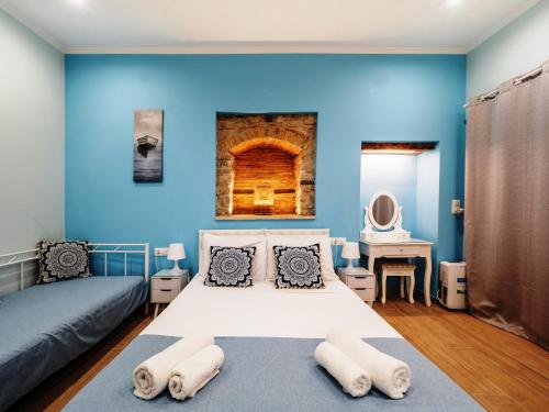 Postel nebo postele na pokoji v ubytování Sole Apartments - near Corfu Port