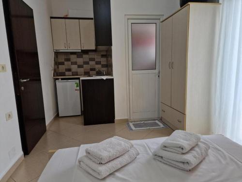 Η κουζίνα ή μικρή κουζίνα στο Eno Apartments
