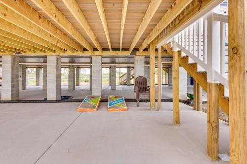 a building under construction with two paintings on the floor at Private Beach and Deck Bayfront Home in Hayes! in Yorktown