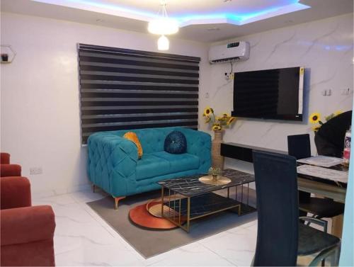 Posezení v ubytování COZY and EXOTIC 3 BED 2 BATH WITH 24HRS LIGHT AND 20 MINS TO AIRPORT