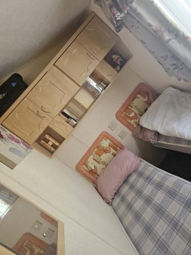an overhead view of a small bedroom with a bed at the chase in Ingoldmells