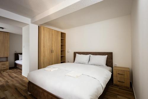 Postel nebo postele na pokoji v ubytování Restoran & Motel Manjež