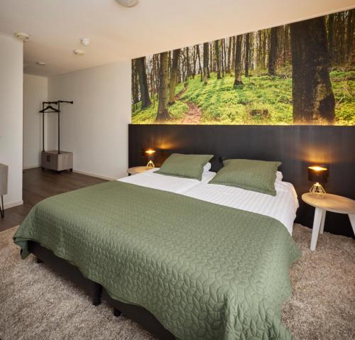 Postel nebo postele na pokoji v ubytování Hotel 't Gemeentehuis
