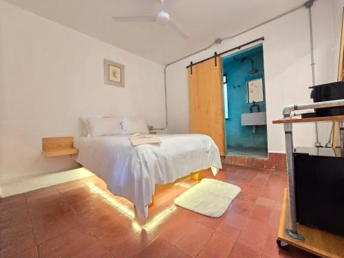 Katil atau katil-katil dalam bilik di Agrado Guest House
