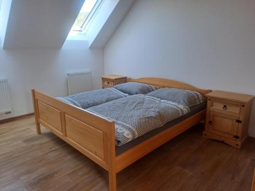 Postel nebo postele na pokoji v ubytování Pension Na Statku- Kočičí apartmán