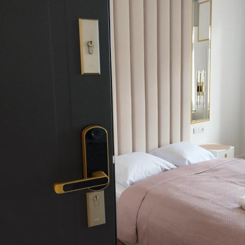 Ένα ή περισσότερα κρεβάτια σε δωμάτιο στο Apartament z Jacuzzi Nova Bydgoszcz