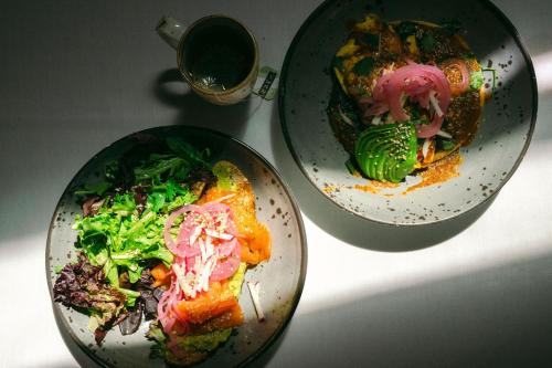 two plates of food sitting on a table at Costanoa in Pescadero