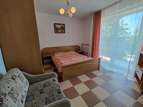 Postel nebo postele na pokoji v ubytování Willa Arka we Władysławowie-Chłapowie