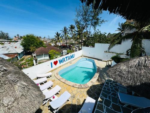 Bazén v ubytování Watamu Villaggio nebo v jeho okolí