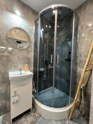 Ένα μπάνιο στο Apartament Centrum Piotra Skargi Słupsk