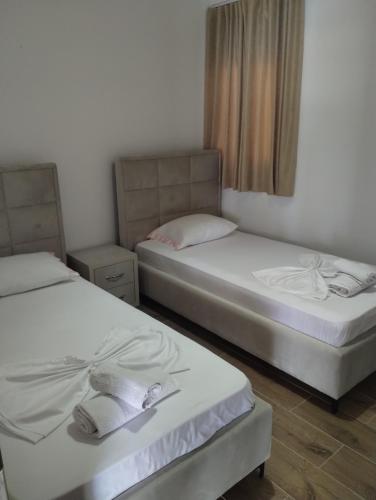 Postel nebo postele na pokoji v ubytování Rafa's Apartament