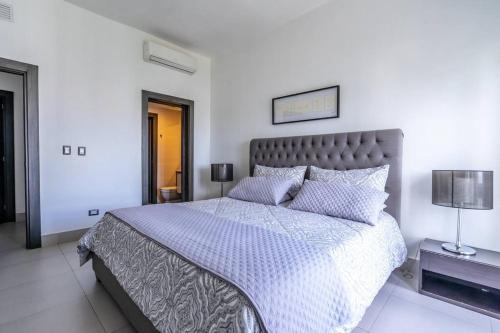 Ένα ή περισσότερα κρεβάτια σε δωμάτιο στο Dream Rooftop Downtown View