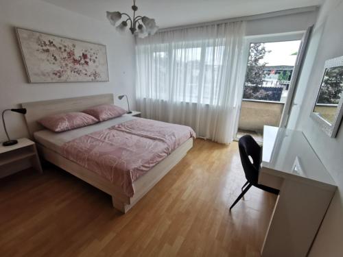 Postel nebo postele na pokoji v ubytování Apartment Tonio - right on the main square