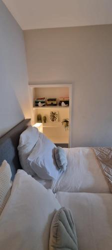 a hotel room with two beds in a room at Casa de Deborah in Zandvoort