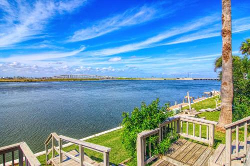 a view of the water with a bridge in the background at Puente Vista 106 in Padre Island