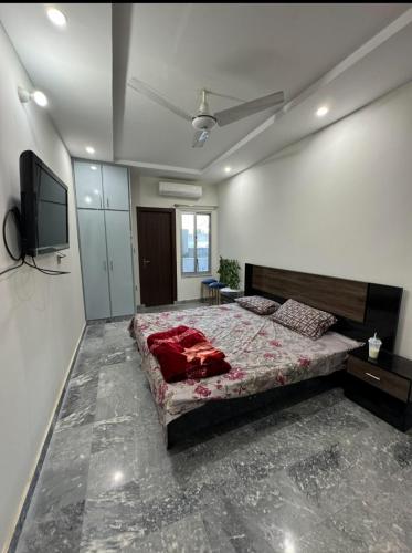 Llit o llits en una habitació de Single Bedroom Apartment