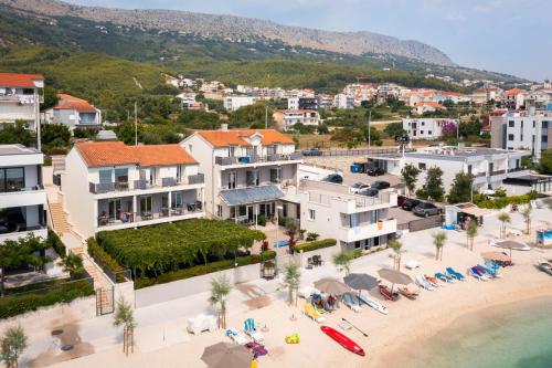 an aerial view of a beach and buildings at Seaside Luxury Suites in Podstrana