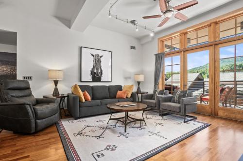 a living room with a couch and chairs at Urban Loft in Downtown Steamboat - Upscale Luxury in Steamboat Springs