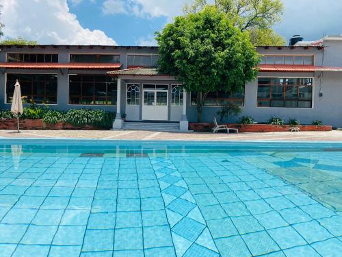 Bazén v ubytování HOTEL EX HACIENDA EL MOLINO nebo v jeho okolí
