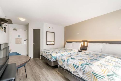 Ένα ή περισσότερα κρεβάτια σε δωμάτιο στο Motel 6 - Augusta, GA