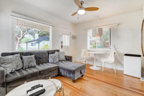 a living room with a couch and a table at Vintage Tiny House CUTE 1BDRM Big Appeal in Colorado Springs