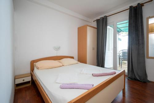 Postel nebo postele na pokoji v ubytování Apartment Vidalici 6519c