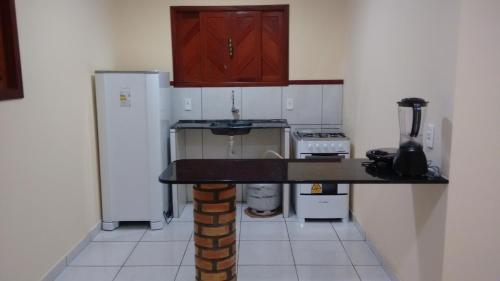 Kuchyň nebo kuchyňský kout v ubytování Chalé Alto Mar Flats