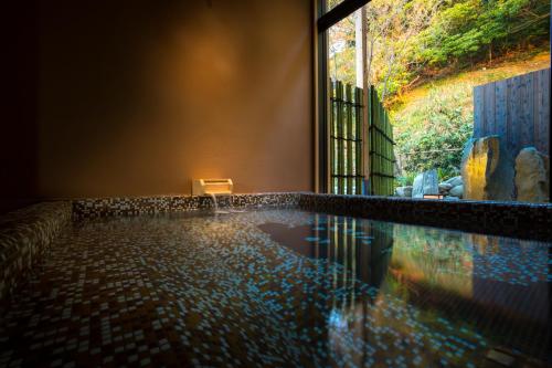 Piscina en o cerca de 間人温泉 炭平