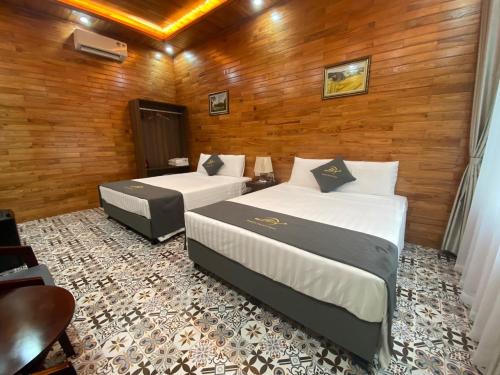 Ένα ή περισσότερα κρεβάτια σε δωμάτιο στο Tam Coc Galaxy Villa