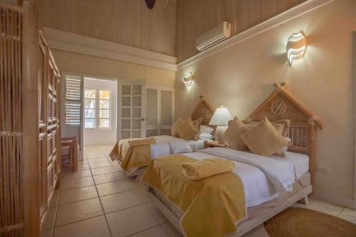Letto o letti in una camera di Villa Yemanjá
