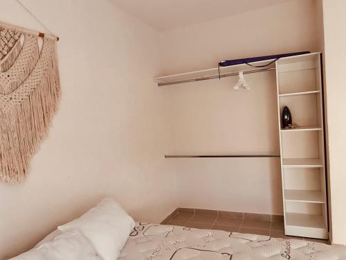 En eller flere senge i et værelse på Casa Frente a Alberca cerca de playa