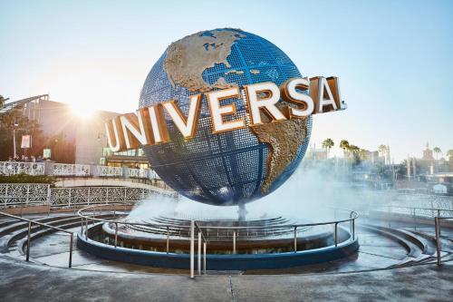 a large sign that reads america in front of a globe at Holiday Inn Express & Suites - Nearest Universal Orlando by IHG in Orlando