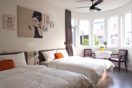 En eller flere senger på et rom på Candy Floss Homestay