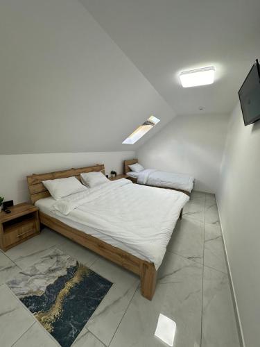 Postel nebo postele na pokoji v ubytování M-23 Hotel