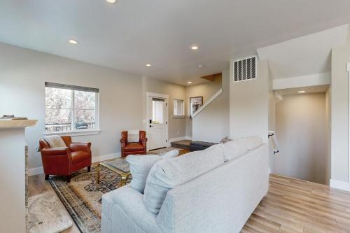 a living room with a couch and chairs at Hailey Haus in Hailey