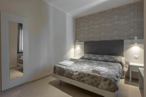 Letto o letti in una camera di Ilenia's Boutique Rooms