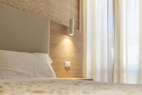 Letto o letti in una camera di Ilenia's Boutique Rooms
