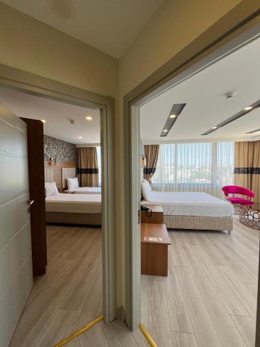 Katil atau katil-katil dalam bilik di Golden Lux Hotel Antalya