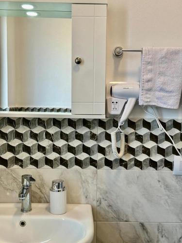Koupelna v ubytování Zeus Hotel